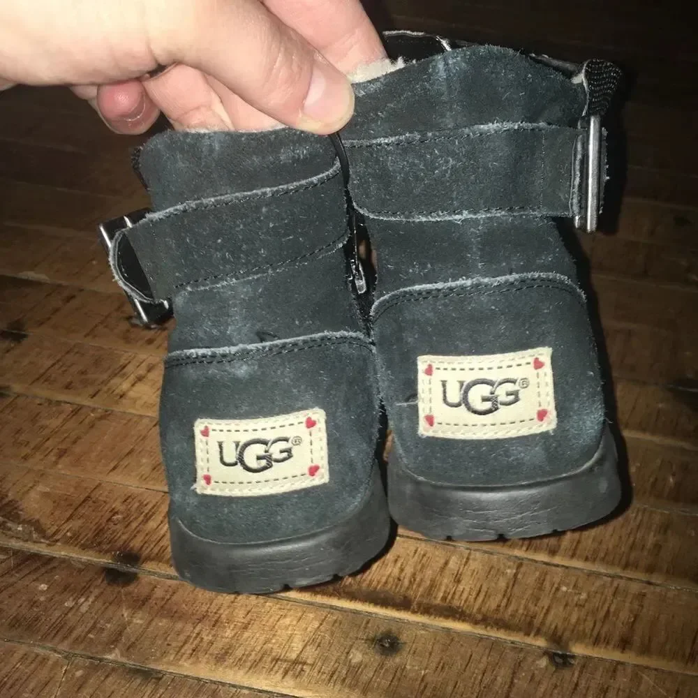 Uggs size 4 shimmery black and silver shearling lined booties